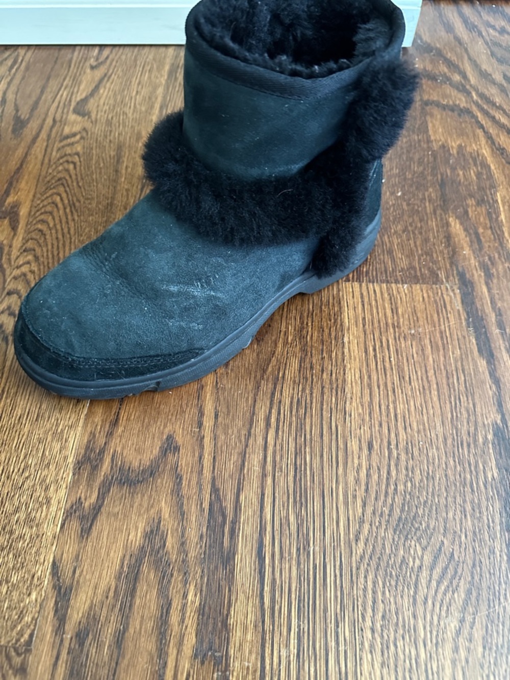 UGG Black Short Shearling Boot with Pom Detail - Picture 7 of 10